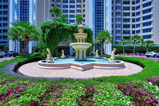 Building Photo - 7117 Pelican Bay Blvd Unit 1001 Rental
