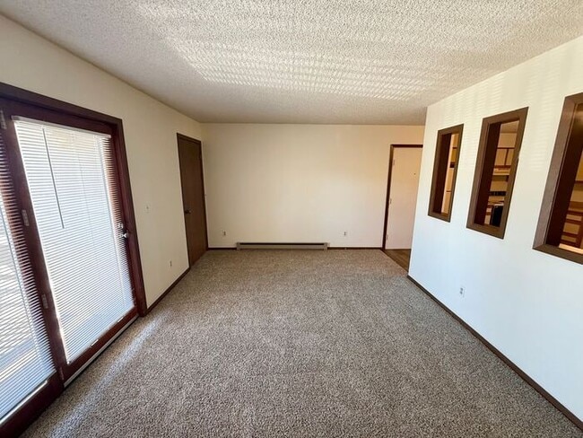 Photo - Limited-Time Move-In Deal: Get Your First 2 Weeks FREE! Spacious 2 Bed, 1 Bath Apartments + Water...