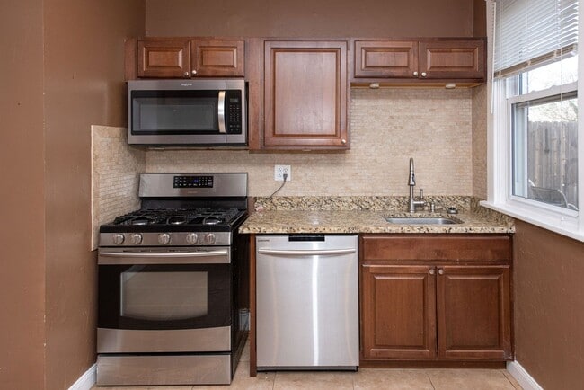 Photo - NORWOOD- UNIT #1, 2+ bedroom 1.5 BATH W/ GARAGE /OVERSIZED YARD/DECK