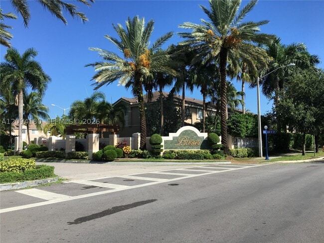 Building Photo - 5600 NW 114th Pl Unit 202