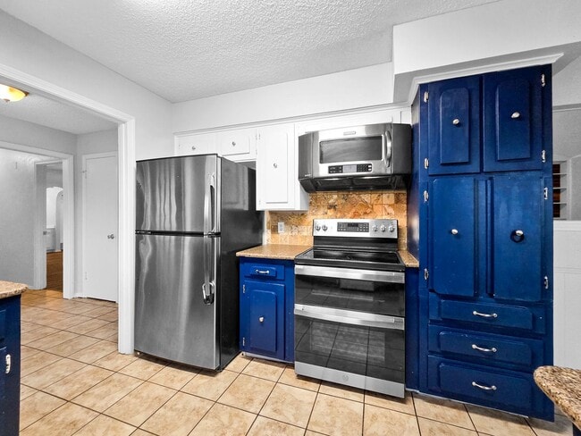 Photo - Coming Soon! 4 BR/2BA | Newly Renovated Single Family Home | 1-Car Garage Parking | Covered Patio...