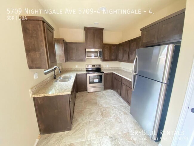 Building Photo - 5709 Nightingale Ave Unit 4,