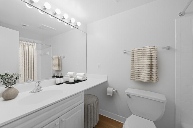 Step into the serene elegance of Fairway Apartments’ bathroom, featuring a bright, clean aesthetic with modern fixtures and thoughtful details. Embrace comfort and style in every corner. Explore your new home today!