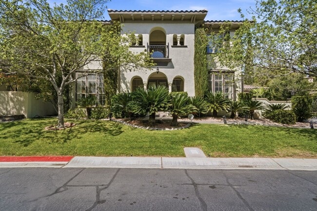 Building Photo - Private Gated Christopher Homes Estate in The Vineyards | Resort-Style Backyard & Strip Views
