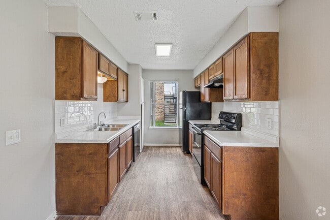4BR, 2BA - 1,077SF - Kitchen