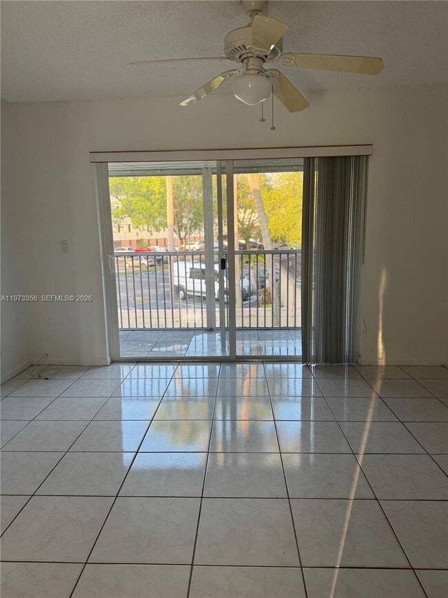 Building Photo - 8750 Royal Palm Blvd Unit 109-3