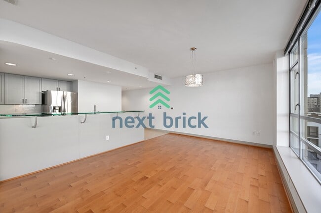 Photo - Stunning 2-Bed Corner Condo with Water and Mountain Views Unit 600