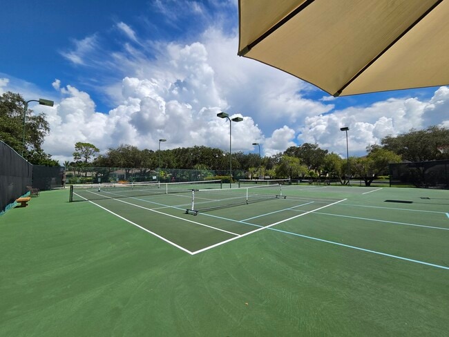 Tennis and pickleball courts next to the VOB/Bermuda Park clubhouse - 25727 Lake Amelia Way Unit 202