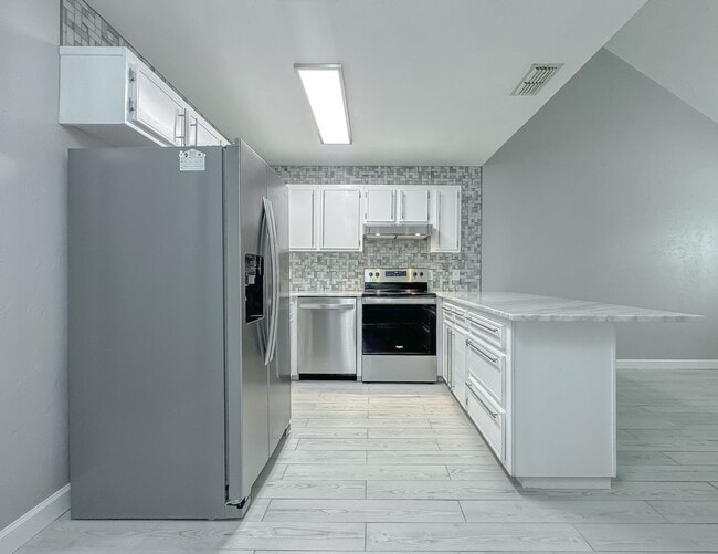 Photo - MODERN! Walk to FSU 2/2 w/ Marble Counters, Stainless Steel Appliances, & Privacy Fenced Yard! Av...