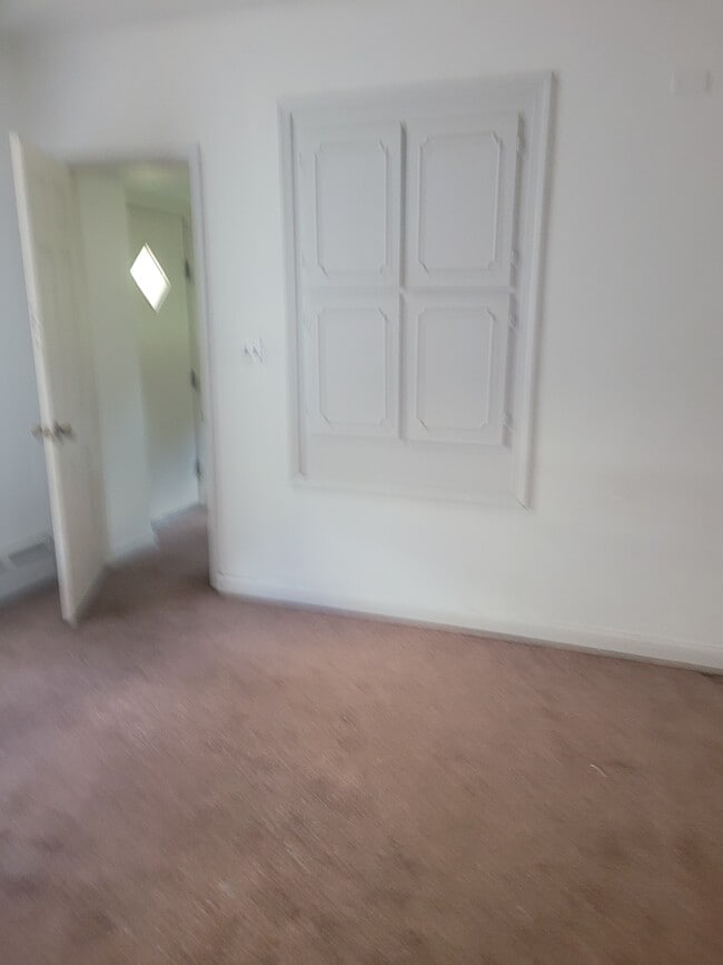 Main bedroom with shelving. - 1413 Darby Rd Unit DarbyRoad