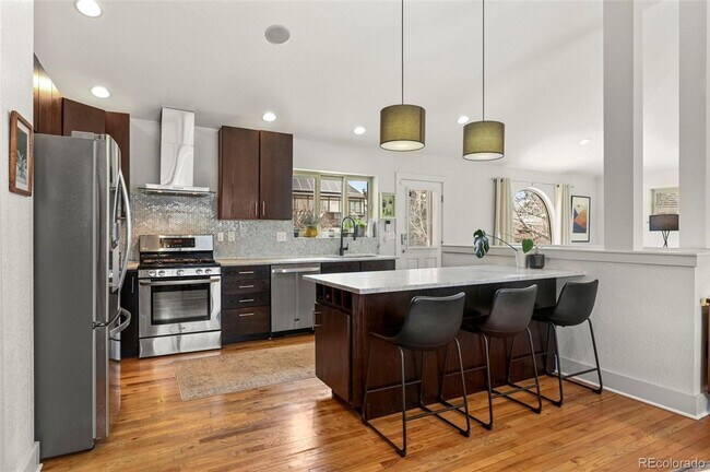 Photo - 4BD, 3BA Park Hill Home with Yard and 2-Car Garage