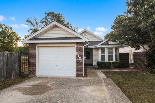 Building Photo - Northeast Pensacola 2BR Home with Fireplace & Covered Patio
