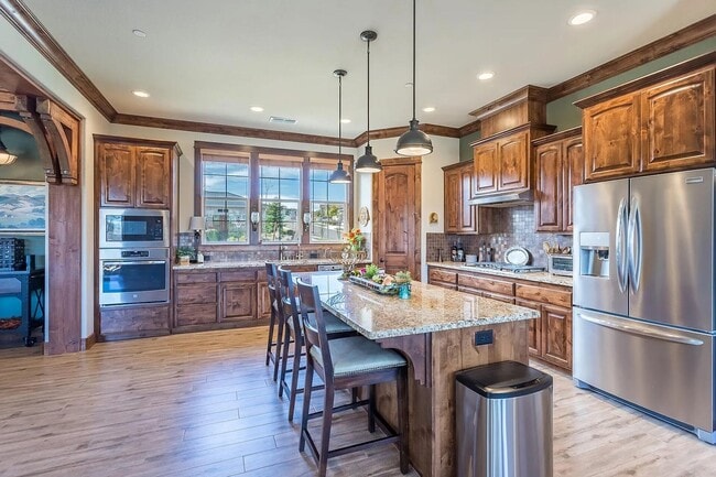 Building Photo - Custom Home with Solar, a Pool & all the Upgrades...in Town...Must See!