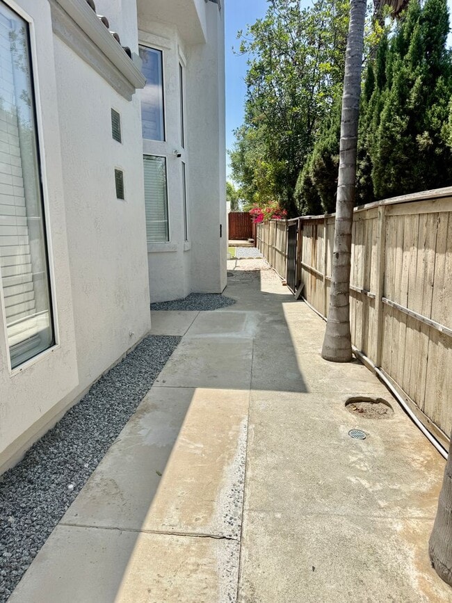 Photo - Spacious 4 Bedroom, 3 Bath Home with 3-Car Garage & Landscaping Included
