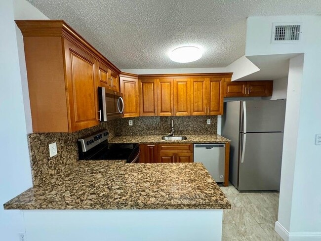 Building Photo - 3662 SW 59th Ave Unit #2