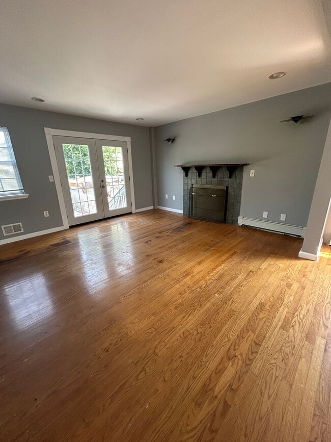 Photo - Discover Your Dream Home in Neptune: Spacious 4-Bedroom, 2.5-Bath with Private Backyard and Drive...