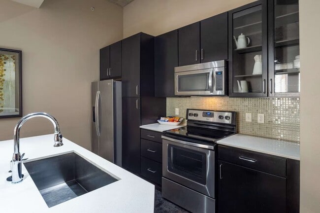 Building Photo - Save Big: Waived Fees & Deposit Credit at ... Unit EMC Rental