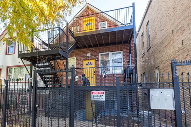 Building Photo - 1833 N Drake Ave Unit 2