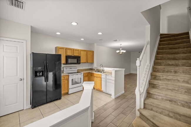 Photo - 2BR Townhome in Wynchase | Dual Suites + Screened Lanai