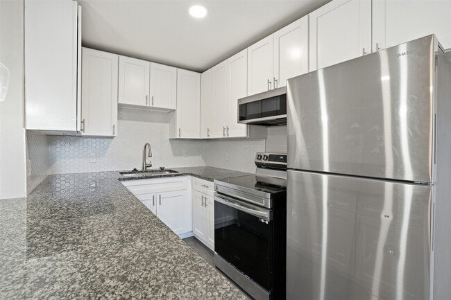 Building Photo - 201 S Kansas Ave Unit G