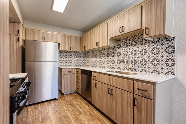 Modern Cabinetry with Custom Backsplash