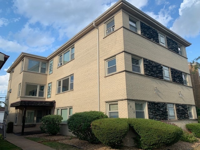 Building Photo - 7912 W Belmont Ave Unit 3N