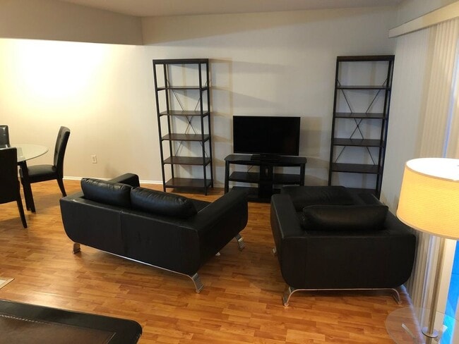 Modern and Spacious living space with leather furniture - 8315 Karam Blvd Unit 8315