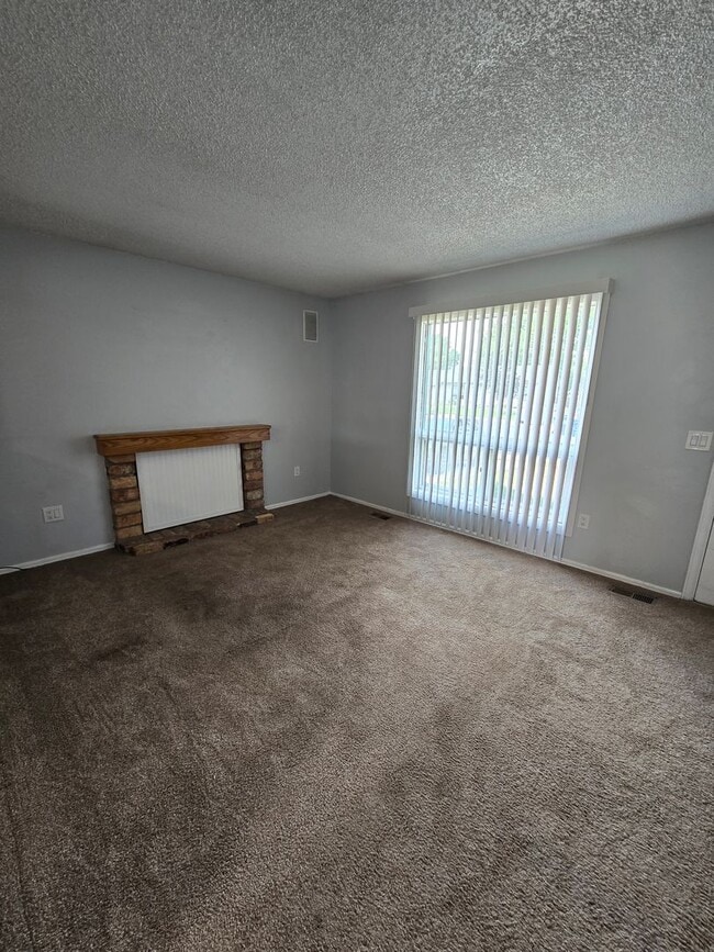 Photo - Inviting 3-Bedroom Home with Expansive Backyard on a Peaceful Cul-de-Sac | Available July 10