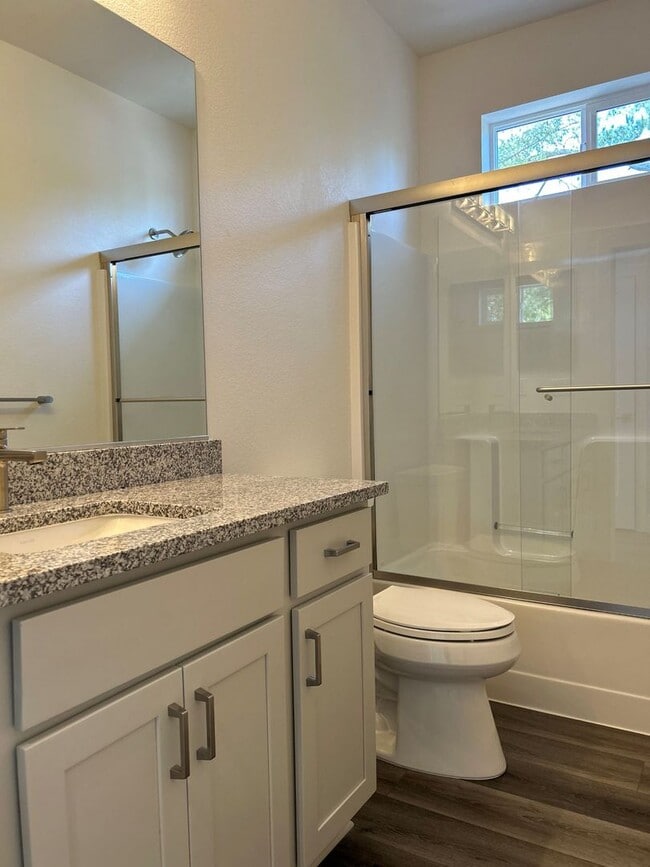 Photo - The Vineyards at Dennis Lane Studio unit with back yard and garage