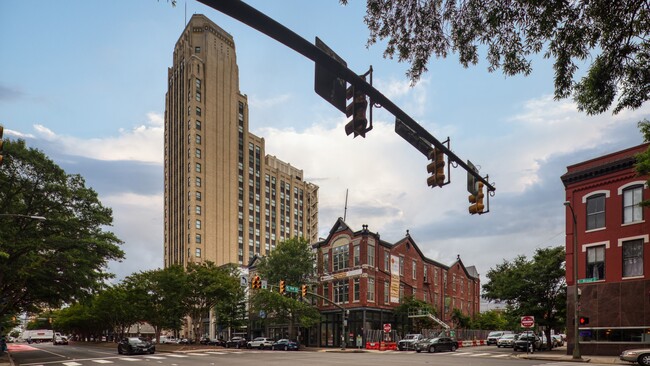 Harpers Flats located at 201 E Broad Street. The Deco at CNB is tall building in background where all amenities are held - Harper's Flats Apartments