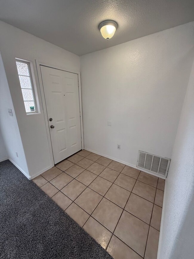 Photo - Spacious 5-Bedroom Home with 2 Living Areas – 2,270 Sq Ft Near Porter Dr.