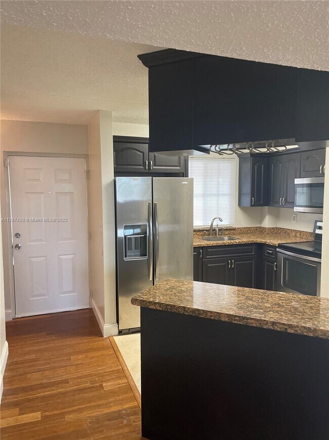 Photo - 6045 NW 186th St Unidad 301