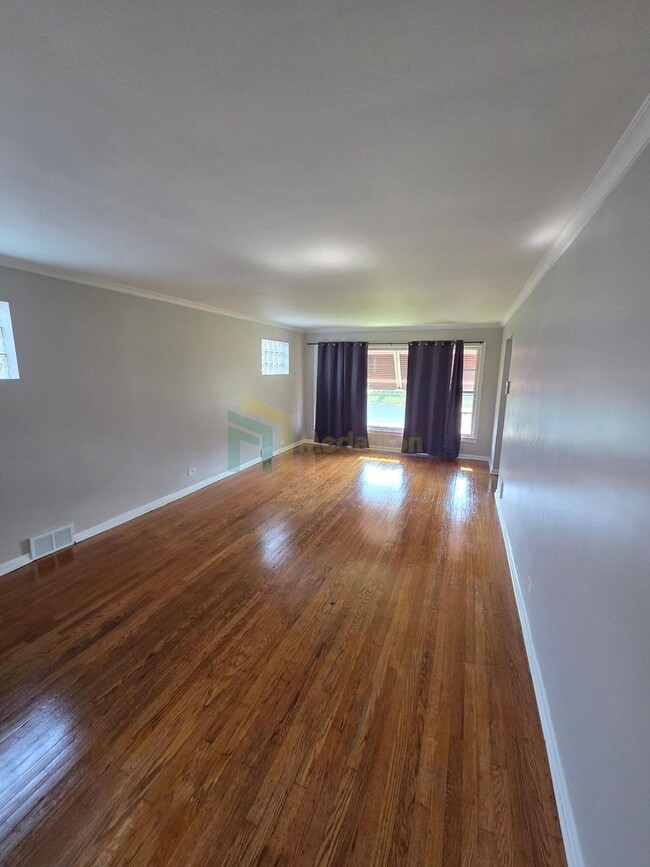 Photo - Beautifully Renovated 4-Bedroom Home with ...