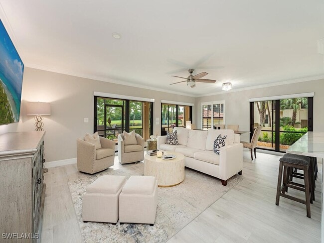 Building Photo - 6080 Pelican Bay Blvd Unit 104A Rental