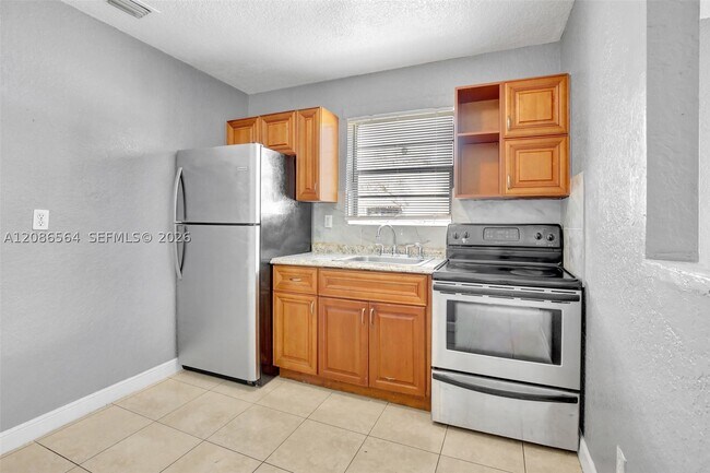 3036 NW 2nd St Unit 1-4