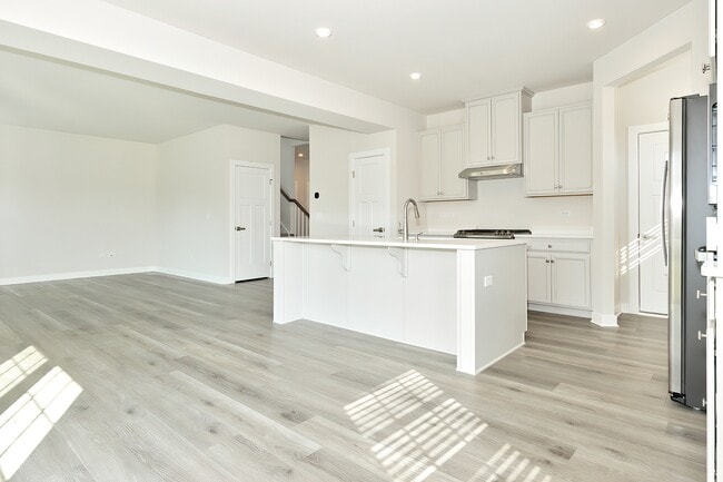 Open-Concept Living and Kitchen Space - Conservancy at Gilberts