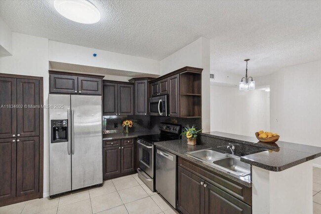 Building Photo - 6952 SW 39th St Unit C105