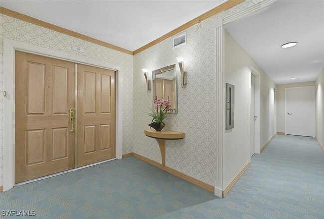 Building Photo - 7515 Pelican Bay Blvd Unit 5B Rental