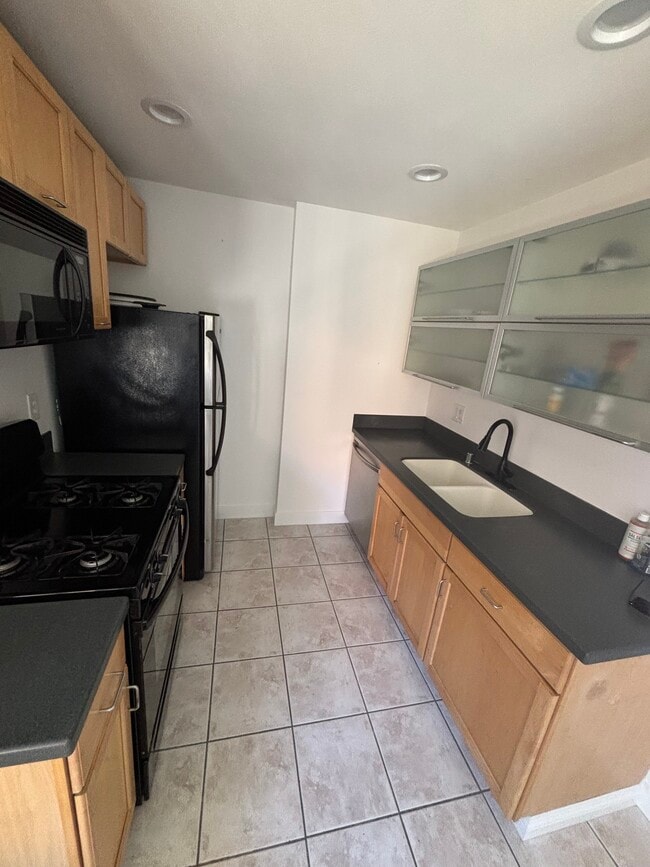 Photo - 6600 Warner Ave Unidad 215