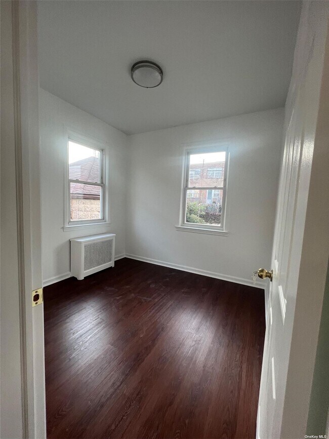 Photo - 41-48-4155 55th St Unit 1Fl