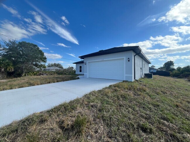 Photo - Brand-New 4BR/2BA Luxury Home with 2-Car Garage – Desirable 33971 Location