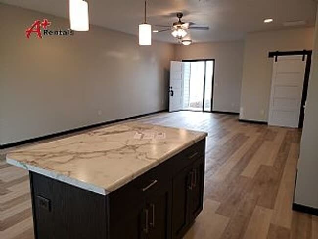 Photo - Three bedroom two bathroom Twin home w/ triple garage