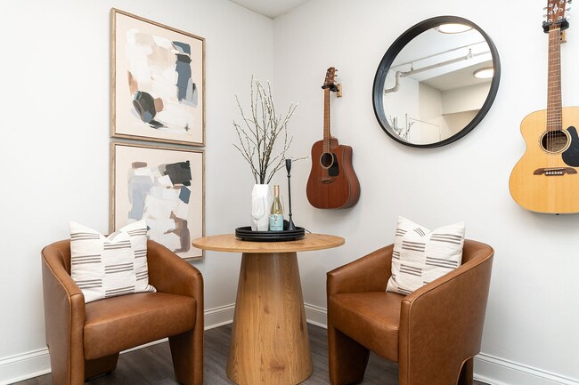 Dining area with hardwood-style flooring
