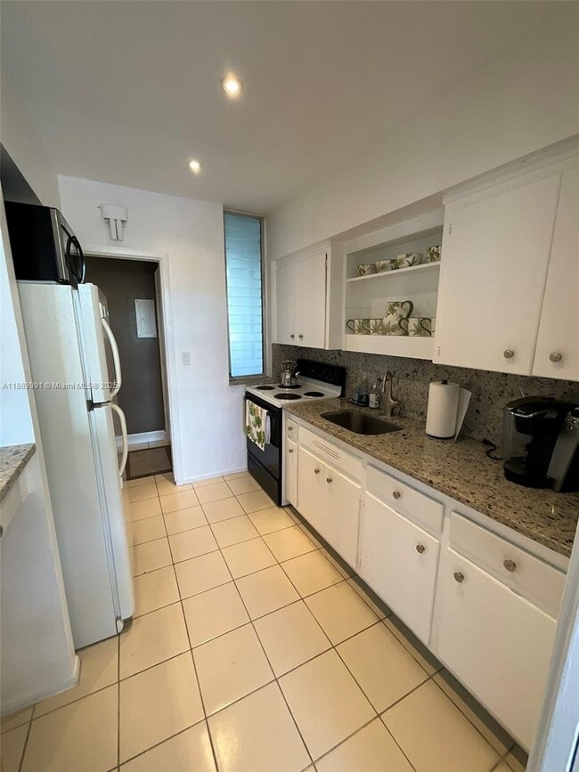 Photo - 10210 Collins Ave Unidad 305