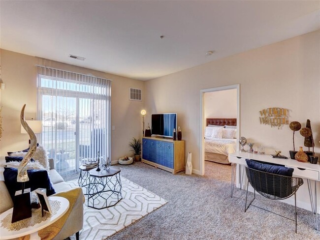 Residence at North Penn living room with natural lighting - Residence at North Penn