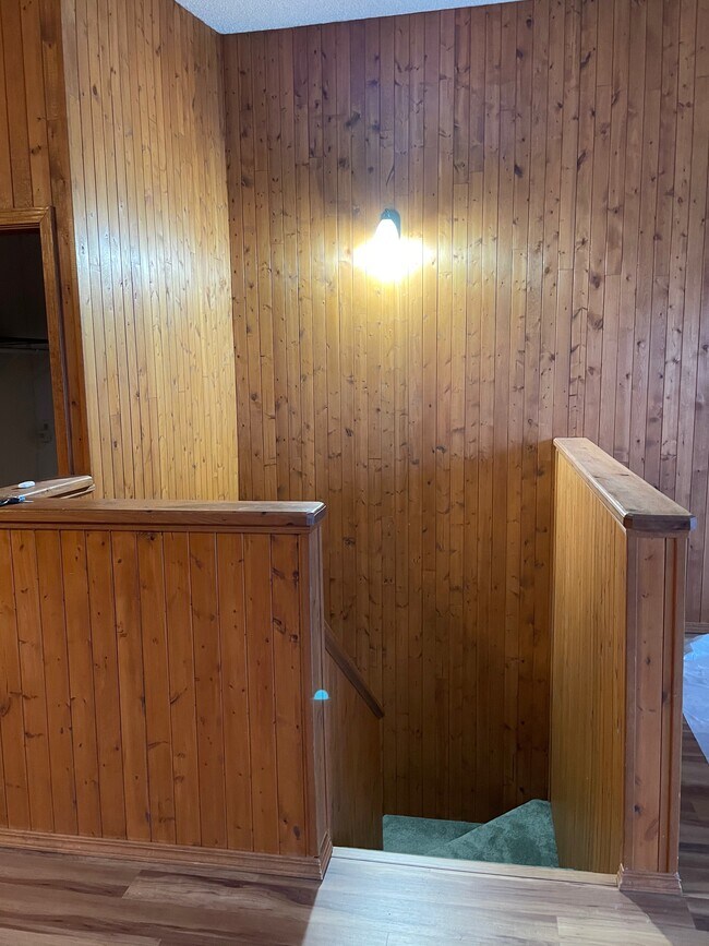 Stairway to lower level - 2533 La Honda Dr Unit 9