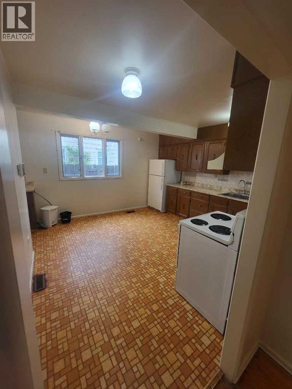 Photo - 941-916 16 St S