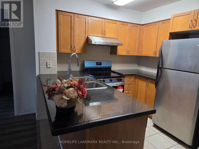 Photo - 7363 Kennedy Rd Unit 211