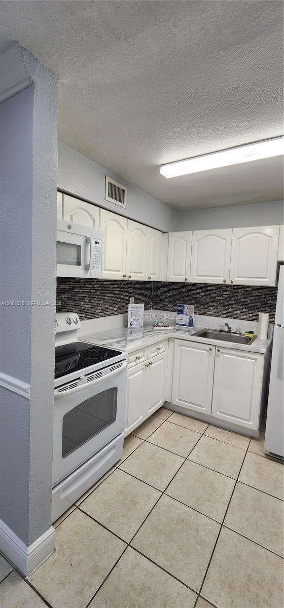 Building Photo - 9405 SW 76th St Unit Y32