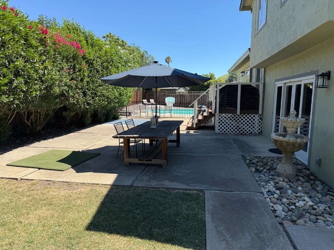 Photo - "Charming Walnut Creek Retreat: Spacious 4-Bedroom Home with Elegant Granite Kitchen, Cozy Firepl...